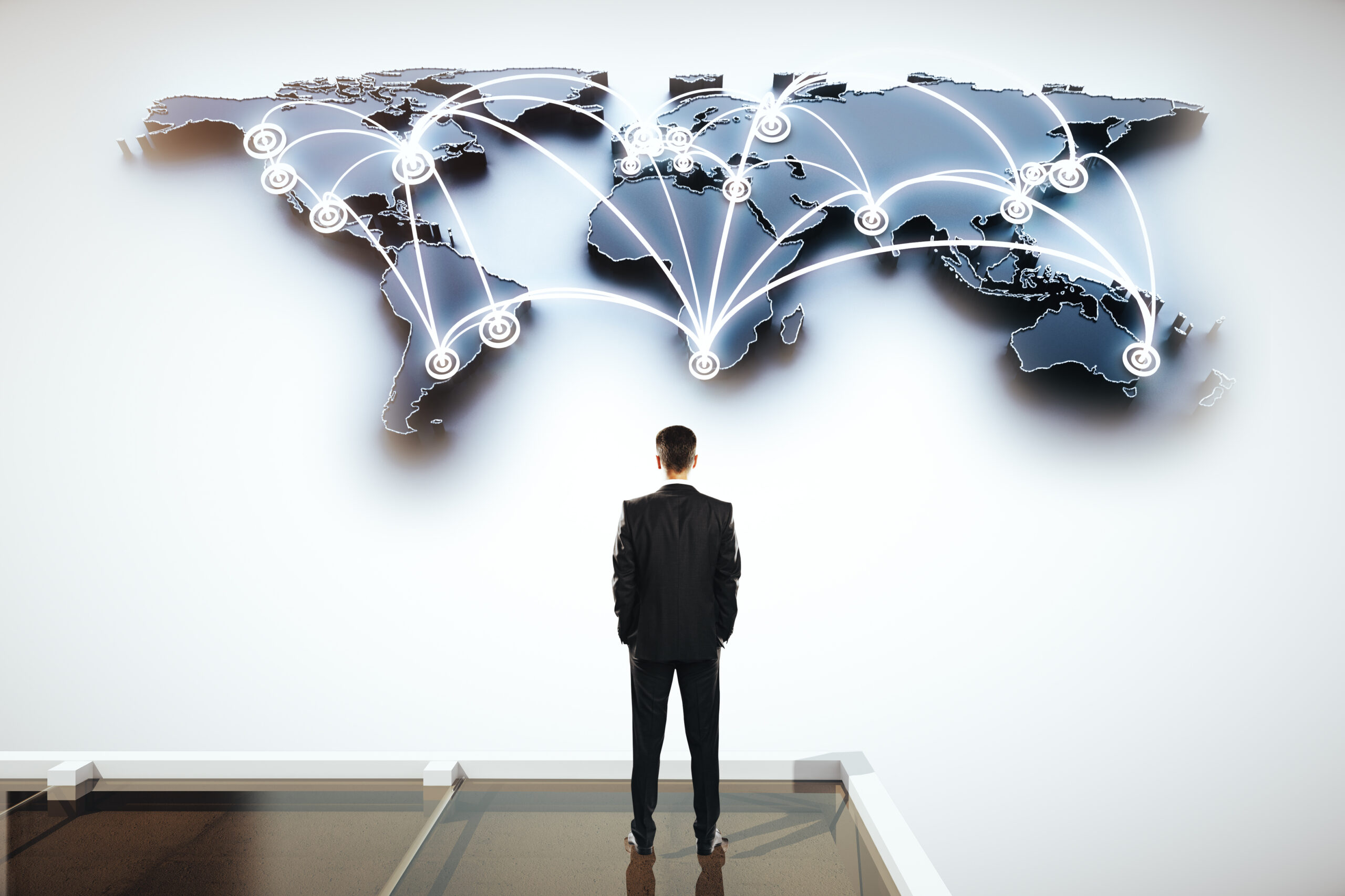 Global,Social,Networking,Concept,With,Businessman,Looking,At,Abstract,Map Global,Social,Networking,Concept,With,Businessman,Looking,At,Abstract,Map